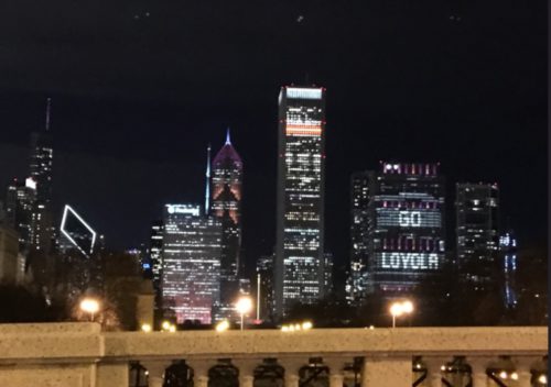 The Chicago skyline lit in maroon and gold supporting Loyola in the NCAA Final Four.